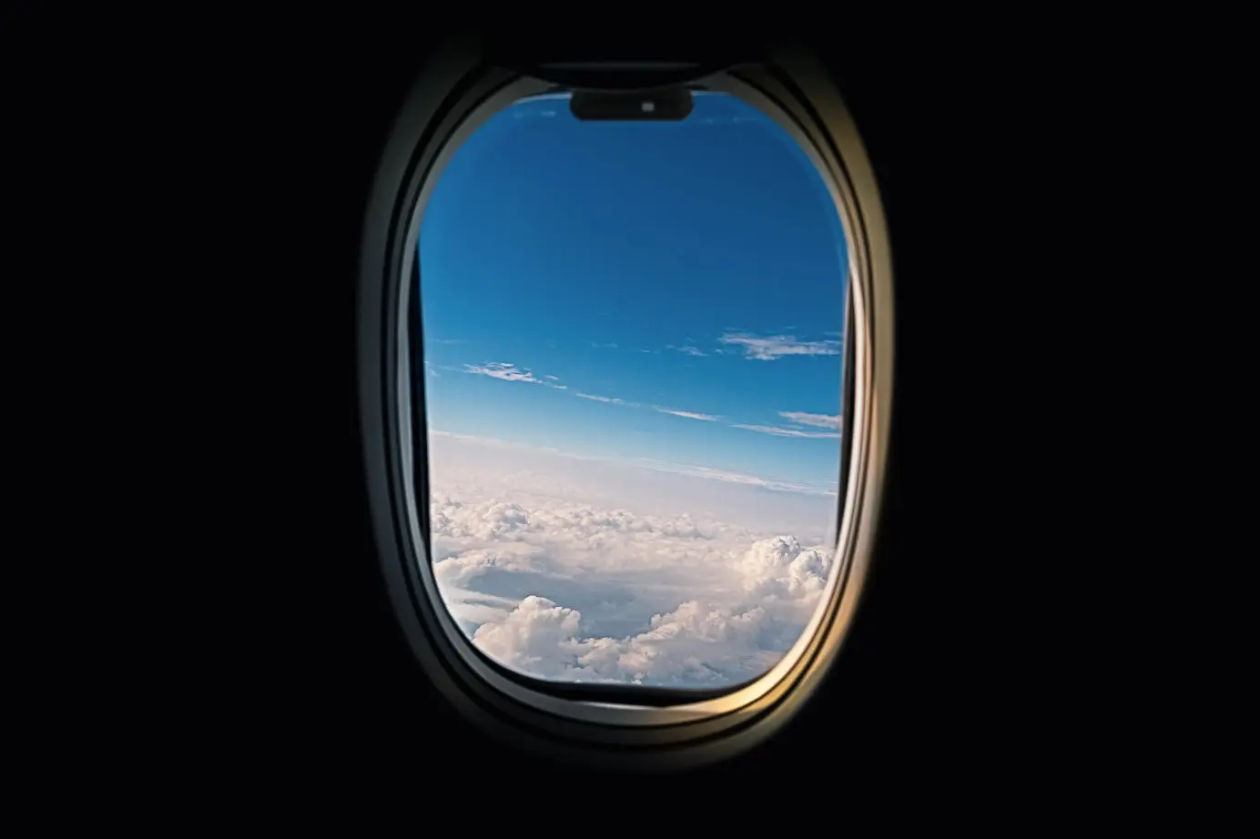 The holes in airplane windows help regulate air pressure