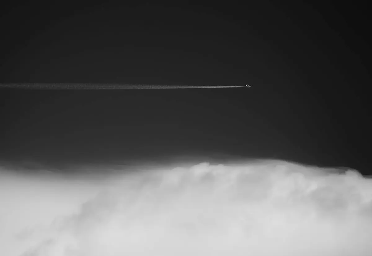 jet airplane above clouds